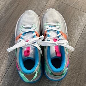 Nike Kids Sneakers in White, Blue, and Pink with Orange Accents